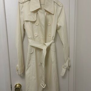 Elegant Cream Trench Coat. New trench coat.. never used.